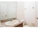 Bathroom featuring a granite countertop and white sink at 2851 Sunstone Dr # 2851, Kissimmee, FL 34758