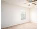 Bedroom with neutral carpet flooring and a window with blinds at 2851 Sunstone Dr # 2851, Kissimmee, FL 34758