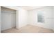 Bedroom features carpet flooring, a window, and closet with shelving at 2851 Sunstone Dr # 2851, Kissimmee, FL 34758