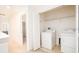 Bright laundry area with a washing machine and dryer for easy chore completion at 2851 Sunstone Dr # 2851, Kissimmee, FL 34758