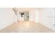 Bright living room with tile flooring, neutral walls, and an open layout at 2851 Sunstone Dr # 2851, Kissimmee, FL 34758