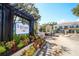 Inviting community entrance with prominent signage, lush landscaping, and a secure gated entry for residents at 2962 Lucayan Harbour Cir # 102, Kissimmee, FL 34746