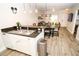 Open concept kitchen and dining area featuring modern appliances and stylish countertops at 2962 Lucayan Harbour Cir # 102, Kissimmee, FL 34746