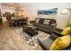 Open concept living room and dining area featuring modern decor and plenty of natural light at 2962 Lucayan Harbour Cir # 102, Kissimmee, FL 34746
