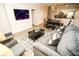 Open concept living room and dining area featuring modern decor and plenty of natural light at 2962 Lucayan Harbour Cir # 102, Kissimmee, FL 34746