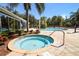 Outdoor jacuzzi next to a community pool at 2962 Lucayan Harbour Cir # 102, Kissimmee, FL 34746