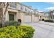 Charming townhome featuring attached garages and well-manicured bushes at 3008 Thornton Dr, Kissimmee, FL 34741