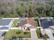 Aerial view of a well-maintained home bordering a nature preserve for added privacy at 3123 Fairfield Dr, Kissimmee, FL 34743
