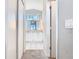 This bathroom features a large mirror, vanity, and lighting at 3123 Fairfield Dr, Kissimmee, FL 34743