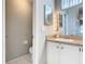 This bathroom features a sink with a granite countertop at 3123 Fairfield Dr, Kissimmee, FL 34743