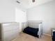 Carpeted bedroom featuring neutral tones and a closet for storage at 3123 Fairfield Dr, Kissimmee, FL 34743