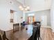 Charming dining area with a formal table, natural light, and access to the living room and kitchen at 3123 Fairfield Dr, Kissimmee, FL 34743