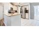 Open kitchen featuring granite countertops and stainless steel appliances at 3123 Fairfield Dr, Kissimmee, FL 34743
