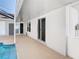 Covered patio with a view of the backyard and access to the pool at 3123 Fairfield Dr, Kissimmee, FL 34743