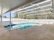 Screened pool with clear blue water and concrete deck offers a refreshing outdoor space at 3123 Fairfield Dr, Kissimmee, FL 34743