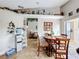 Cozy dining area with a view to the living room, perfect for enjoying Gathering meals and entertaining guests at 3233 Brewster Dr, Kissimmee, FL 34743