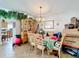 Bright dining area with a wooden table and hutch, creating an inviting space for meals at 3233 Brewster Dr, Kissimmee, FL 34743