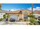 Inviting single-story home with a well-manicured front yard and an attached one-car garage at 3233 Brewster Dr, Kissimmee, FL 34743