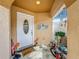 Cozy front porch featuring a welcoming door, cheerful decor, and comfortable seating arrangements at 3233 Brewster Dr, Kissimmee, FL 34743