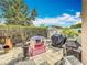 Cozy backyard patio with a playground, BBQ, and some patio seating at 3233 Brewster Dr, Kissimmee, FL 34743