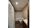Well-lit bathroom featuring a granite countertop, oval sink, and a shower-tub combo at 34517 Laralack Ave, Leesburg, FL 34788