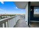 Condo balcony offering a city view, featuring a concrete railing and a tile floor at 400 E Colonial Dr # 1504, Orlando, FL 32803