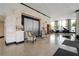 Beautifully designed lobby with decorative columns, elegant seating, and large windows providing ample natural light at 400 E Colonial Dr # 1504, Orlando, FL 32803