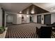 Well-lit lobby with decorative flooring, seating, and modern art adding to the building's aesthetics at 400 E Colonial Dr # 1504, Orlando, FL 32803