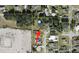 An aerial view of property is surrounded by lush greenery at 4235 W Vista Ct, Kissimmee, FL 34746