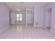 Open living room with neutral color walls, recessed lighting, and tile flooring at 4235 W Vista Ct, Kissimmee, FL 34746