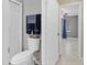 Bathroom features include a toilet, towel rack, and tile flooring at 4884 Meadow Dr, St Cloud, FL 34772