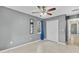 A view of the bedroom shows the closet, tile floors, and natural light at 4884 Meadow Dr, St Cloud, FL 34772
