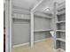 Spacious closet with built-in shelving and rod system at 4884 Meadow Dr, St Cloud, FL 34772