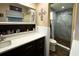 Updated bathroom with a modern vanity, sleek fixtures, and a walk-in shower with contemporary tile at 5019 Saint Germain Ave, Orlando, FL 32812
