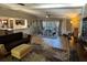Open-concept living area with a dining space, a comfortable sitting area, and seamless transitions at 5019 Saint Germain Ave, Orlando, FL 32812