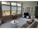 Bright living room features large windows offering a view of the property and neighborhood at 5019 Saint Germain Ave, Orlando, FL 32812