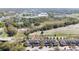 Aerial view of townhomes with proximity to green spaces and amenities at 521 Pacito Way, St Cloud, FL 34769