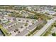 Aerial view highlights the neighborhood's layout and nearby commercial areas at 521 Pacito Way, St Cloud, FL 34769