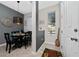 Inviting entryway leading to a dining area with stylish decor at 521 Pacito Way, St Cloud, FL 34769