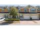 Charming townhome with a brick driveway and a one-car garage at 521 Pacito Way, St Cloud, FL 34769