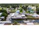 Aerial view of waterfront community with canal access, highlighting the home's location at 534 Minnow Ct, Kenansville, FL 34739