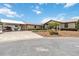 Beautiful single-story home with lush landscaping, large carport, and well-maintained driveway at 534 Minnow Ct, Kenansville, FL 34739