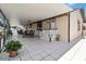 Large, covered patio perfect for outdoor seating and entertaining at 534 Minnow Ct, Kenansville, FL 34739