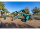 Community playground with slides, climbing structures, and a cushioned surface at 5685 Surprise Lily Dr, Winter Garden, FL 34787