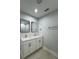 Bathroom featuring a double sink vanity and modern fixtures at 6 Bahia Course Ln, Ocala, FL 34472