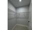Walk-in closet featuring installed shelving and storage at 6 Bahia Course Ln, Ocala, FL 34472