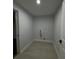 Spacious laundry room with utility connections for washer and dryer at 6 Bahia Course Ln, Ocala, FL 34472