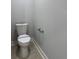 Bathroom featuring toilet with modern gray walls at 6 Bahia Course Ln, Ocala, FL 34472