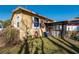 Backyard view featuring a screened-in area, providing privacy and shade at 615 N Emory Ave, Kissimmee, FL 34741