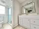 Bathroom featuring a large shower and vanity area at 616 N Palm Ave, Kissimmee, FL 34741